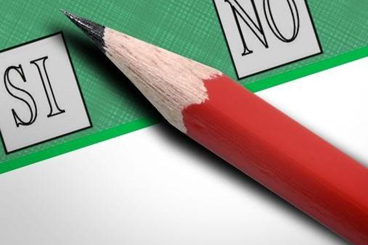 due quadrati con dicitura SI e NO e matita rossa su sfondo verde e grigio  